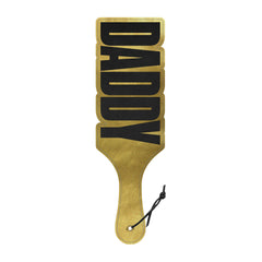 Wood Rocket Daddy Paddle in gold faux leather with bold black letter cutouts
