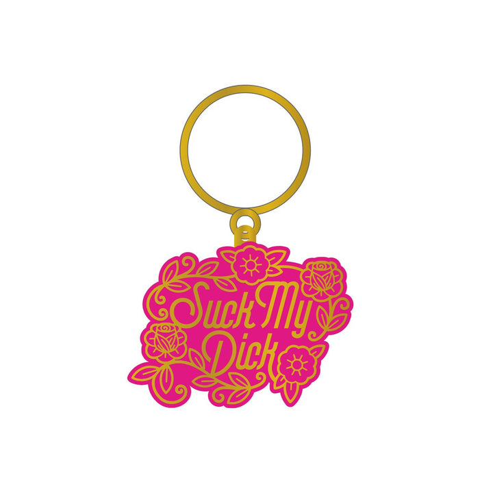 Wood Rocket Suck My Dick enamel keychain in pink and gold with floral design
