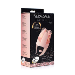 XR Vibrassage Caress pink clitoral massager with three silicone ticklers