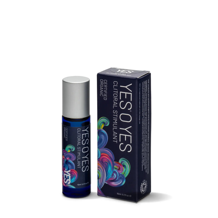 YES O YES Clitoral Stimulant Oil roller bottle and dark navy box on white background