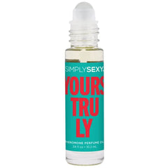Close-up of Yours Truly Pheromone Perfume Oil clear glass roller bottle, 10.2 mL