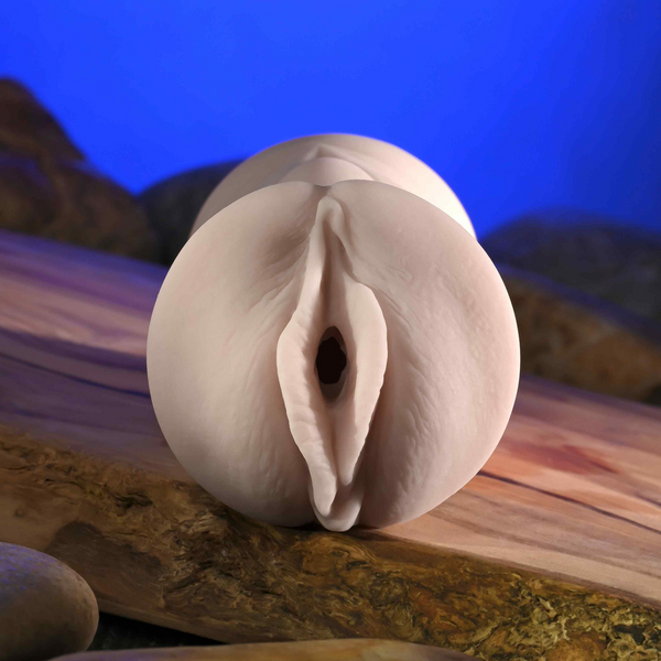 Zero Tolerance mini vagina stroker front view, ivory-toned realistic soft material