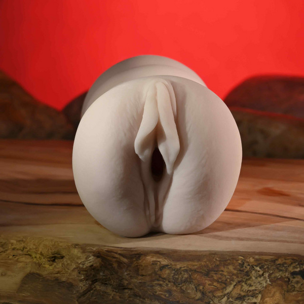Zero Tolerance Riley Reid Mini Vagina Stroker front view, soft ivory open-cell material